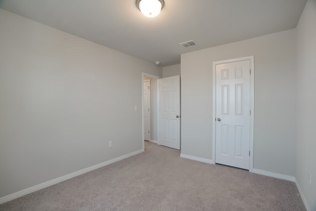 205 Guemal Road Buda, TX 78610 - Photo 26 of 33 a view of an empty room