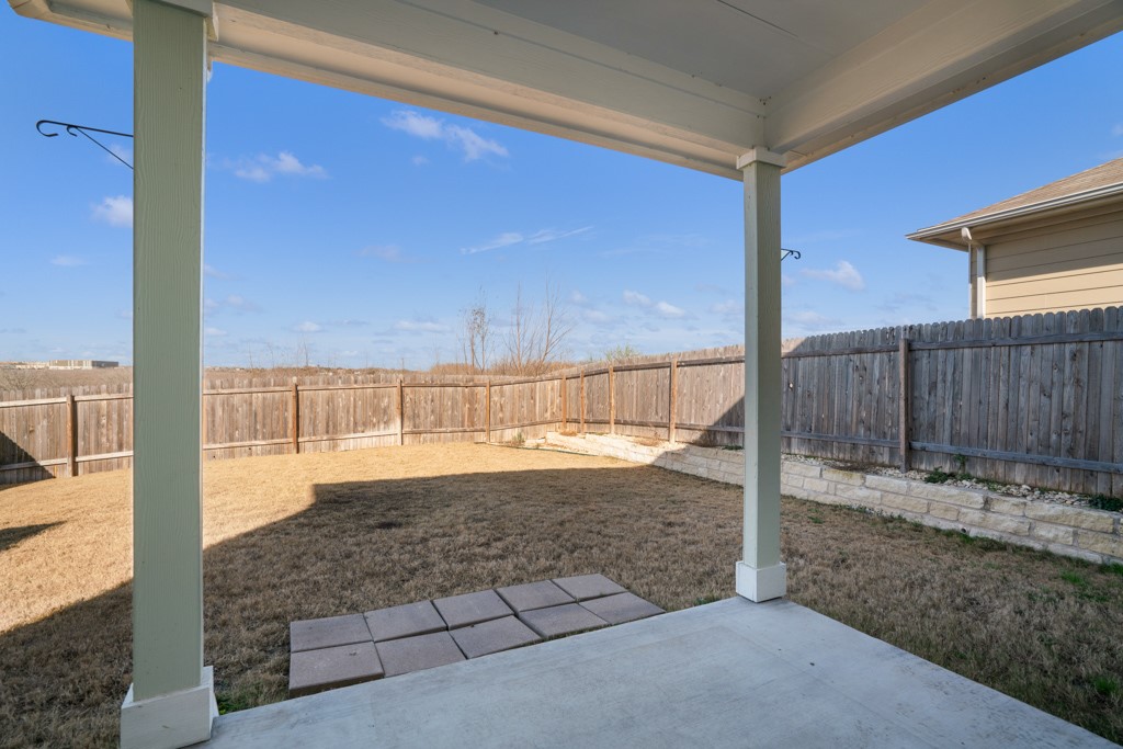 205 Guemal Road Buda, TX 78610 - Photo 27 of 33 a view of a backyard