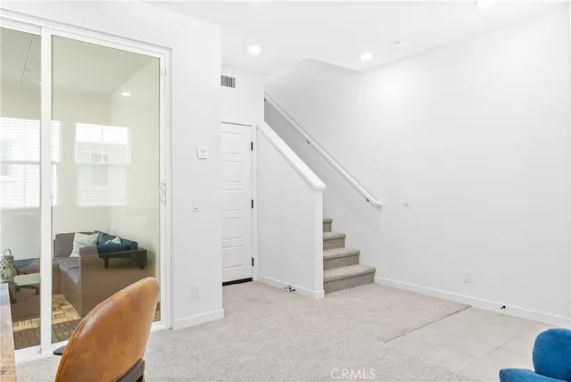 a view of entryway with livingroom