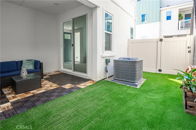 a backyard of a house with seating space