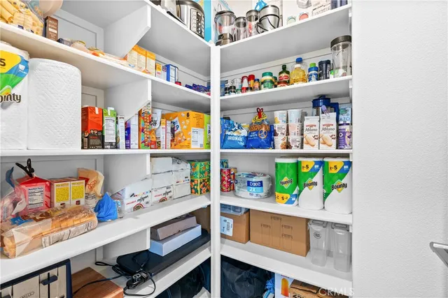 a room with furniture and a wooden floor