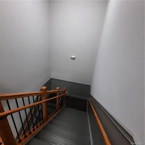 a hallway with wooden floor