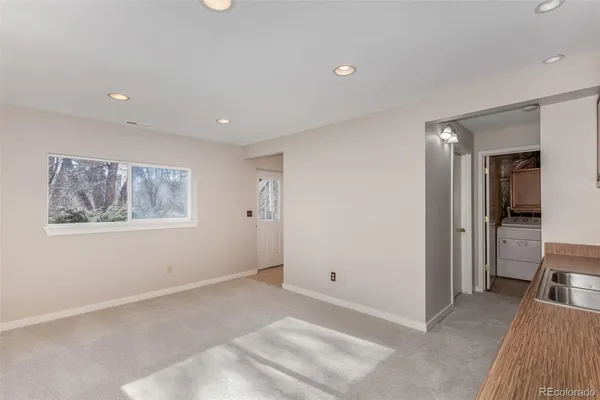 a view of a hallway with a bedroom