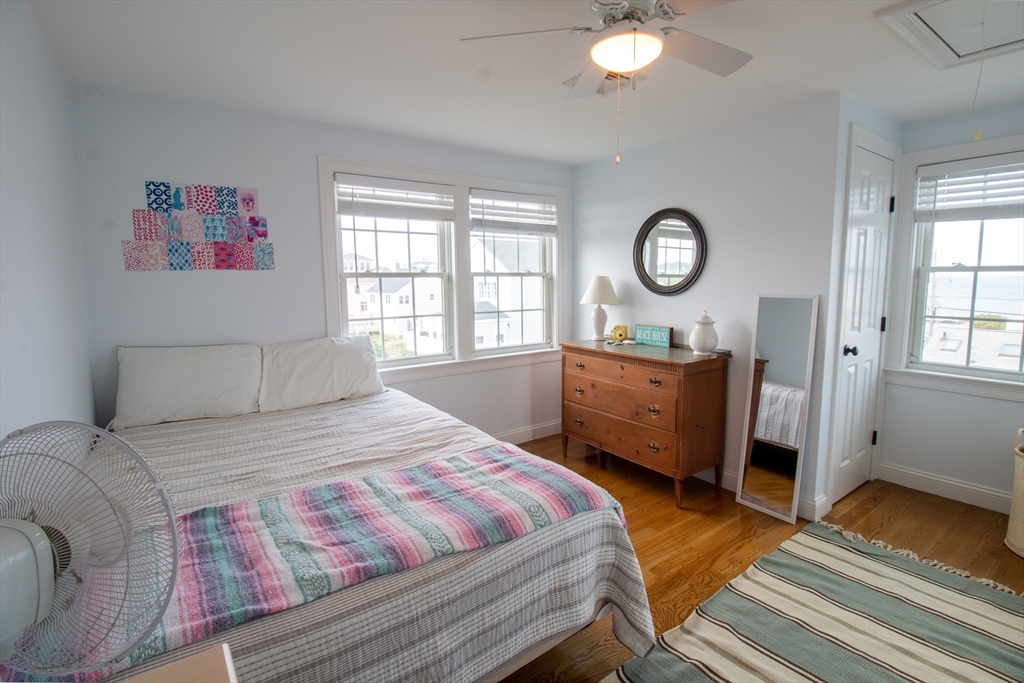 117 River Street Scituate, MA 02050 - Photo 19 of 23 a bedroom with a bed and a window