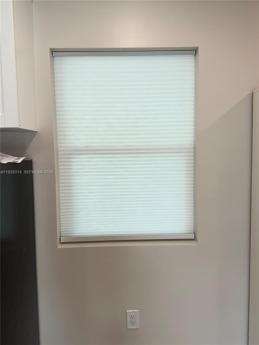 3360 Southwest 24th Terrace, Unit 3362B Miami, FL 33145 - Photo 5 of 15 a close up of a white wall