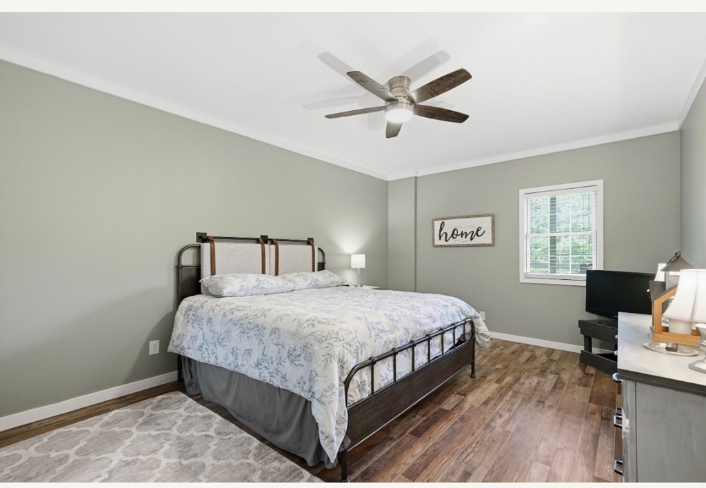 178 Windy Valley Lane Blue Ridge, GA 30513 - Photo 24 of 37 a bedroom with a bed and window
