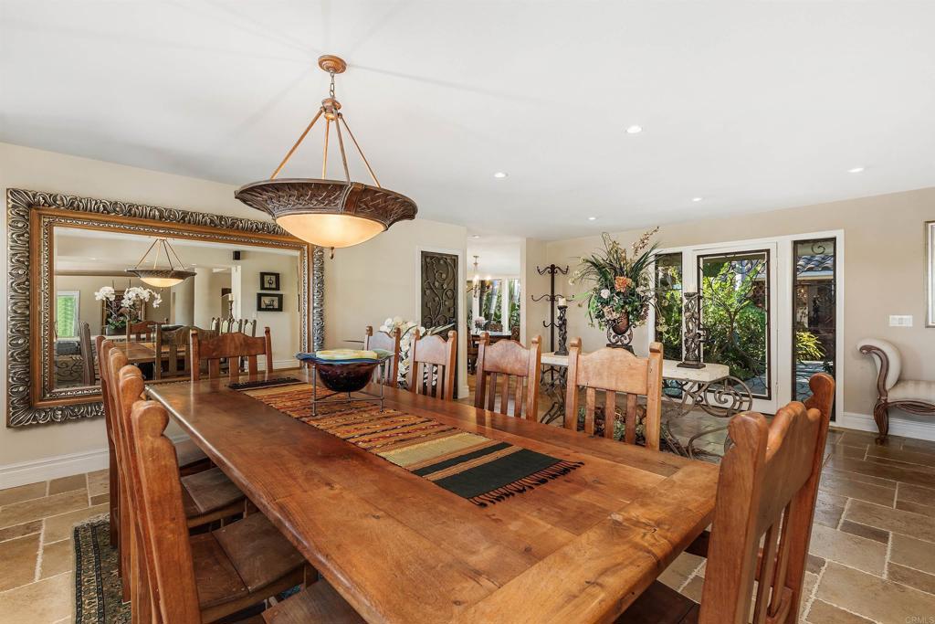 16346 Via Del Alba Rancho Santa Fe, CA 92067 - Photo 5 of 34 a living room with furniture a window and a table