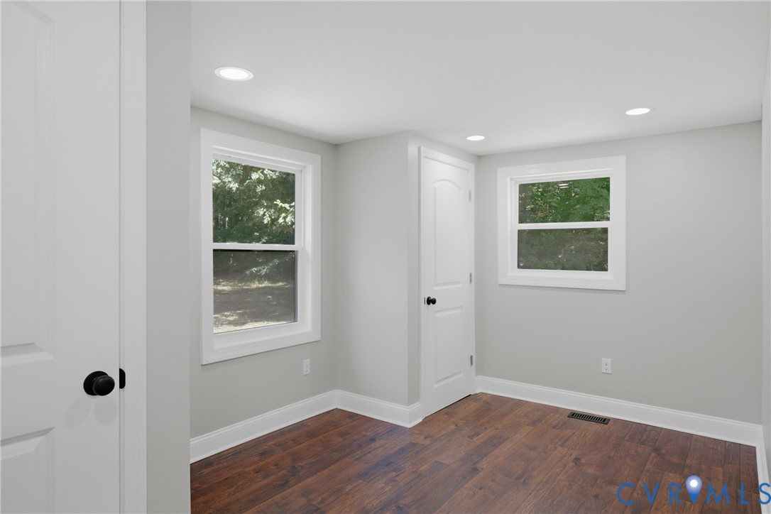 3497 Bumpass Road Beaverdam, VA 23015 - Photo 13 of 28 Bright room featuring wood-finish flooring, two la