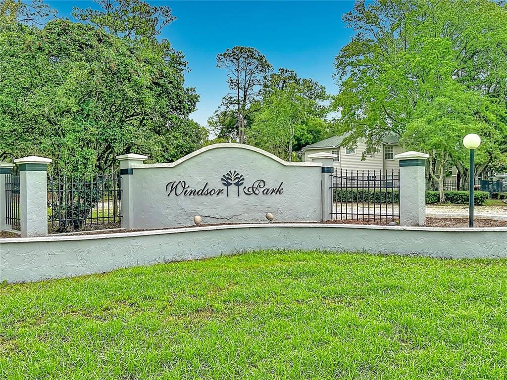 3705 Southwest 27th Street, Unit 922 Gainesville, FL 32608 - Photo 30 of 34 a view of a park that has a sign on it