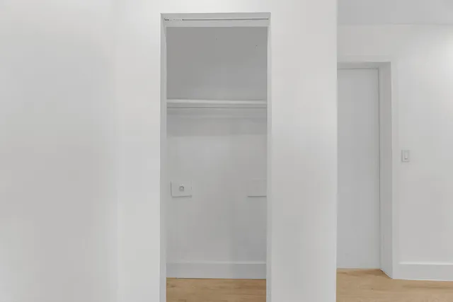 a kitchen with a washer and dryer