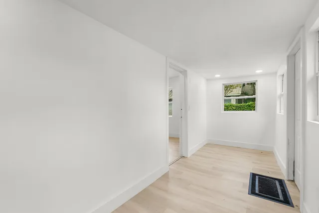 a view of a room that has a window in it