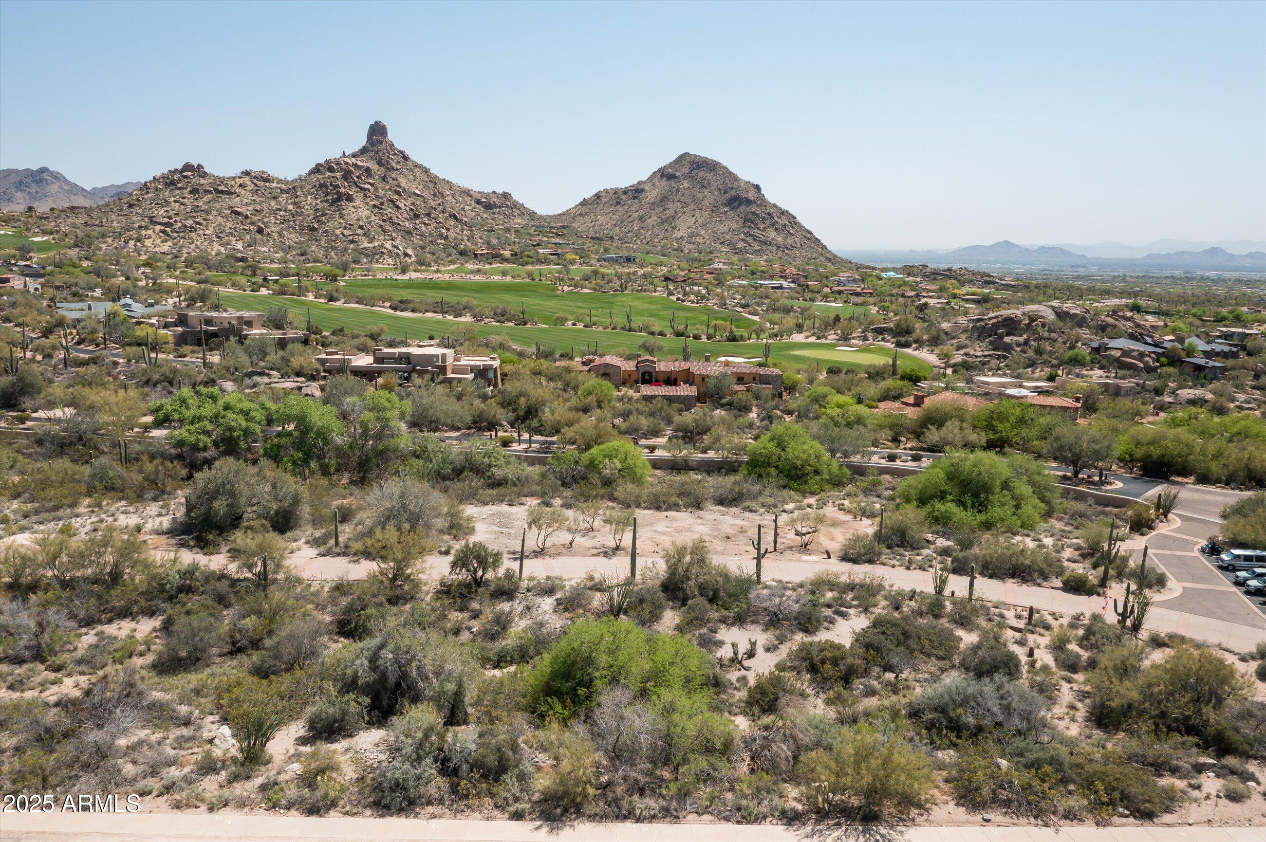 9804 East Running Deer Trail, Unit 1 Scottsdale, AZ 85262 - Photo 5 of 11 a view of a town with mountains in the background