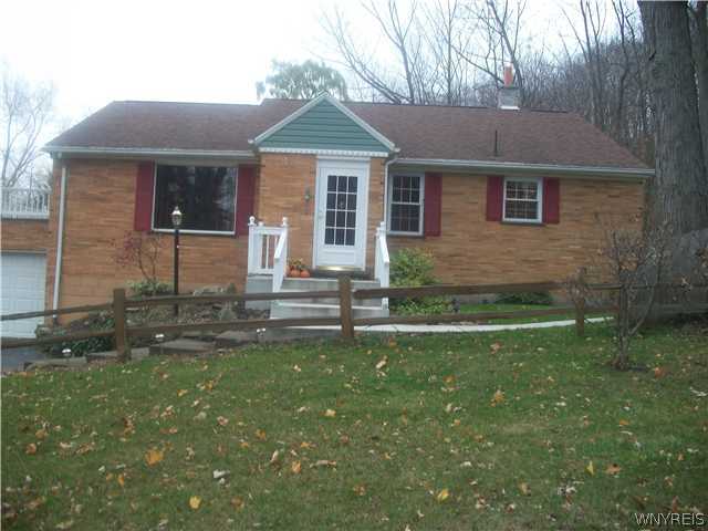 4923 Creek Rd Extension Lewiston, NY 14092 - Photo 1 of 1 Exterior Front Lovely hillside ranch