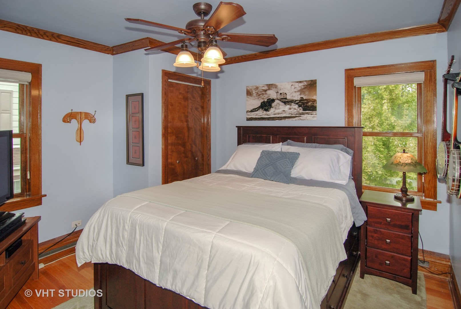 460 Shenstone Road Riverside, IL 60546 - Photo 12 of 23 a bedroom with a bed and a chandelier