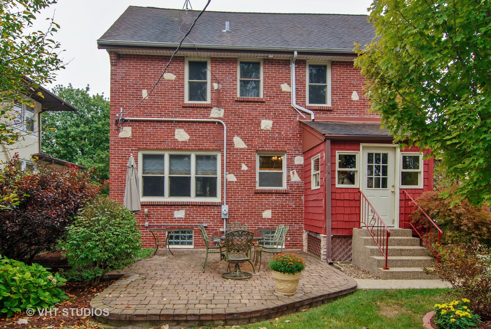460 Shenstone Road Riverside, IL 60546 - Photo 14 of 23 a front view of a house with yard porch and furniture