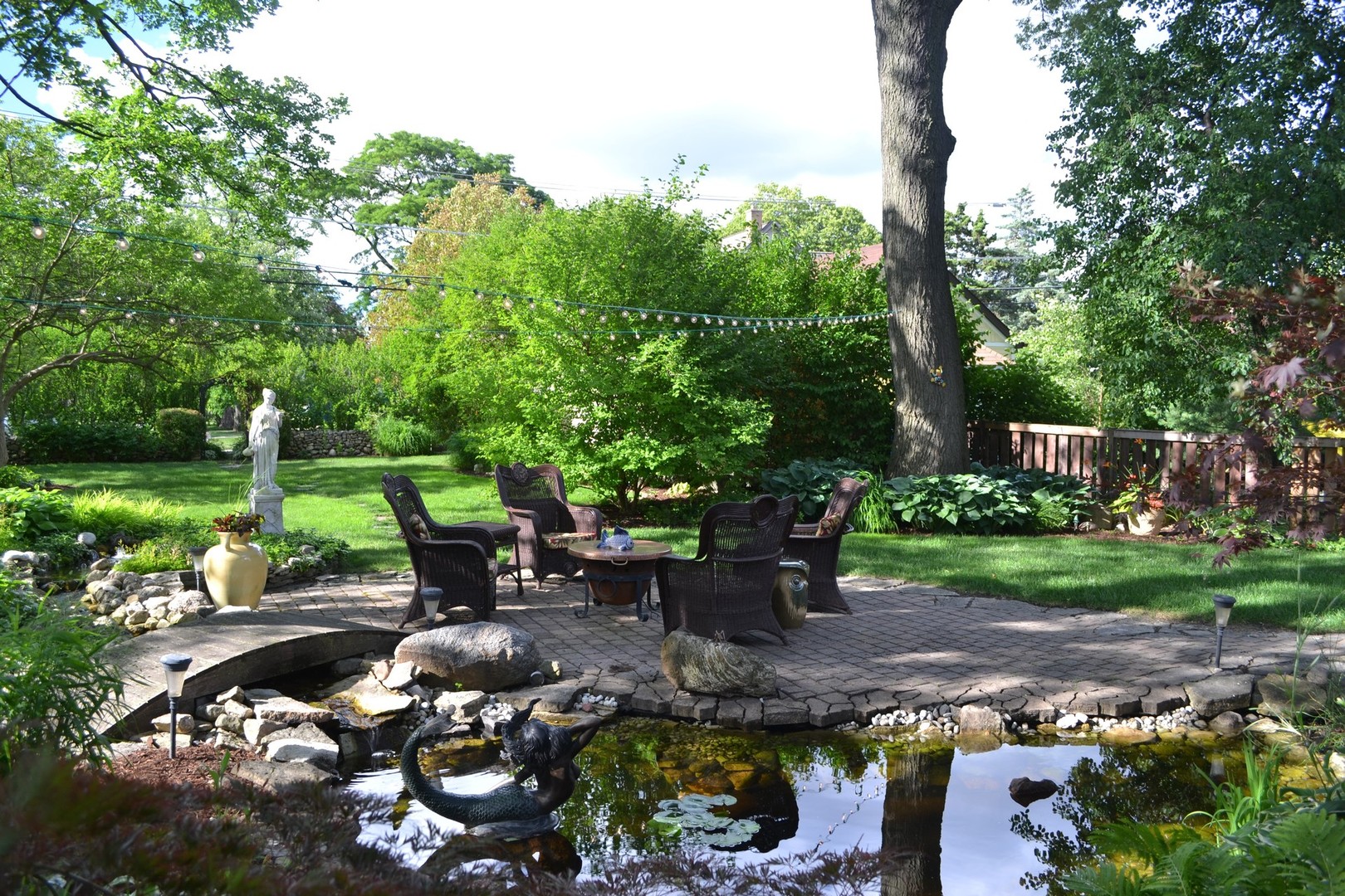 460 Shenstone Road Riverside, IL 60546 - Photo 20 of 23 a view of a bench in a garden