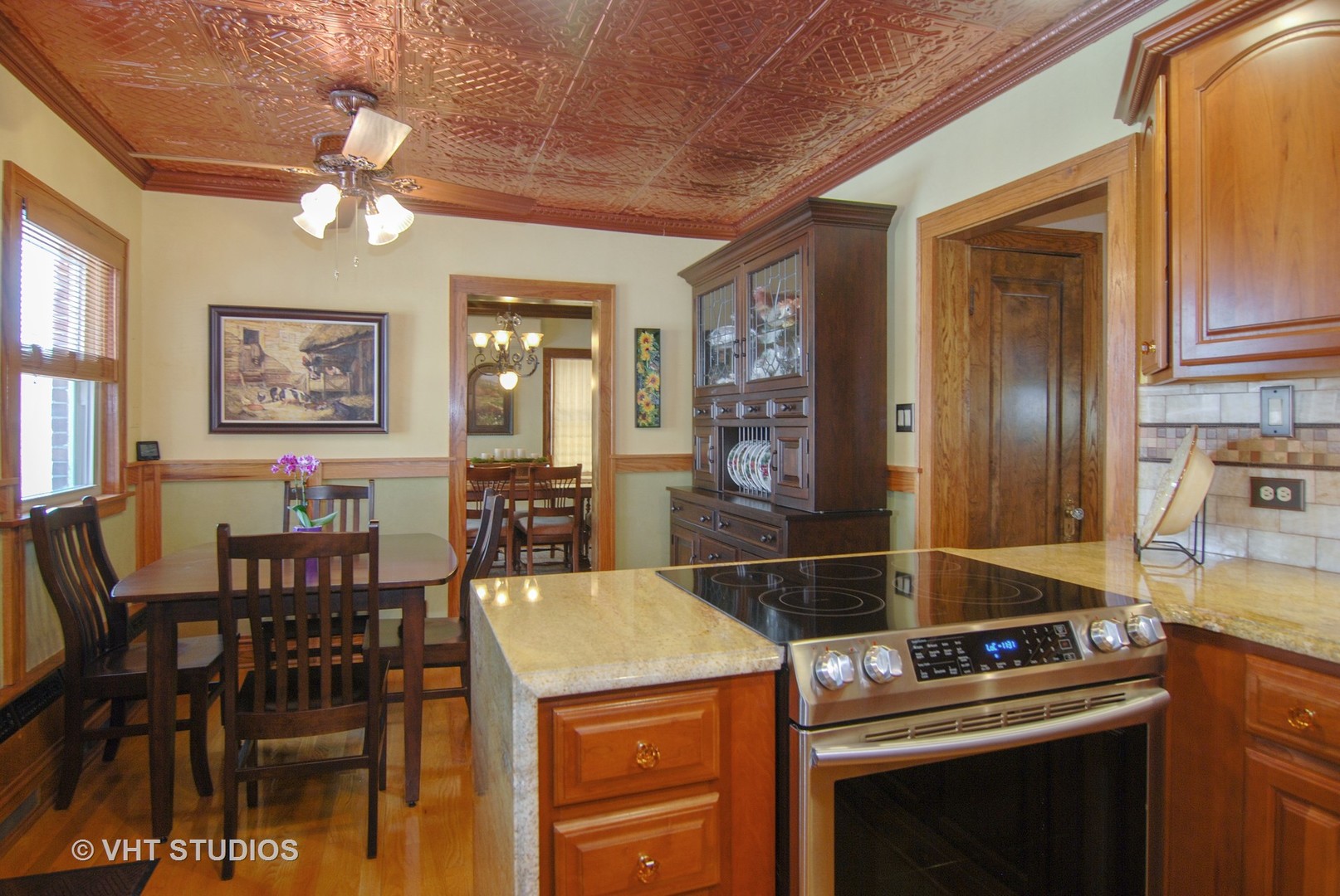 460 Shenstone Road Riverside, IL 60546 - Photo 6 of 23 a kitchen with a stove and cabinets