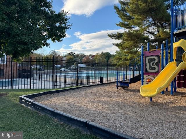 14901 McKisson Court, Unit 7CC Silver Spring, MD 20906 - Photo 21 of 34 View of playground w/swimming pool in background