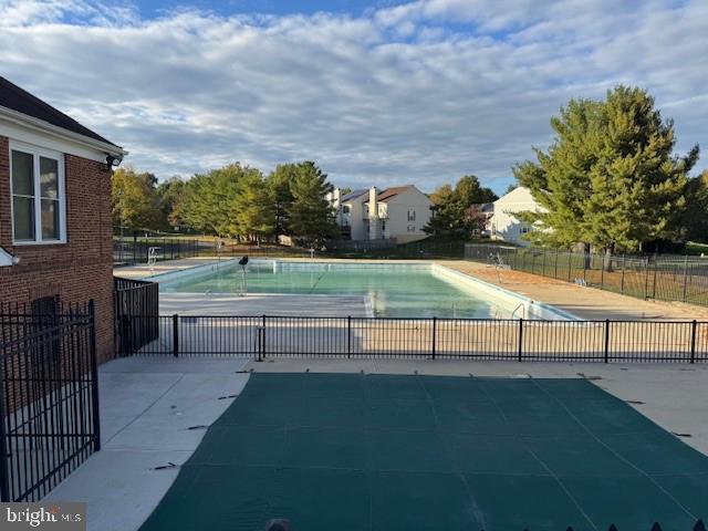 14901 McKisson Court, Unit 7CC Silver Spring, MD 20906 - Photo 22 of 34 Swimming Pool & kiddie pool (covered)