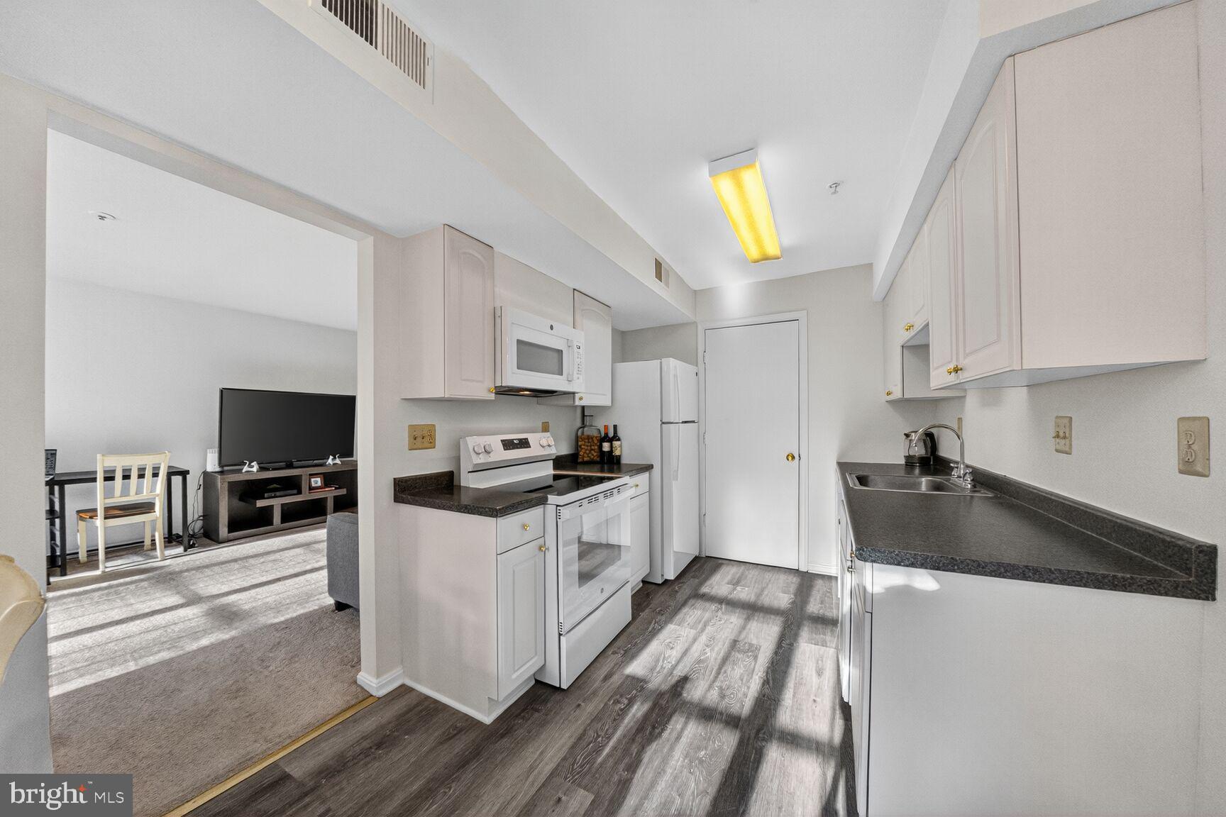 14901 McKisson Court, Unit 7CC Silver Spring, MD 20906 - Photo 8 of 34 View from Table Spaced area in KITCHEN