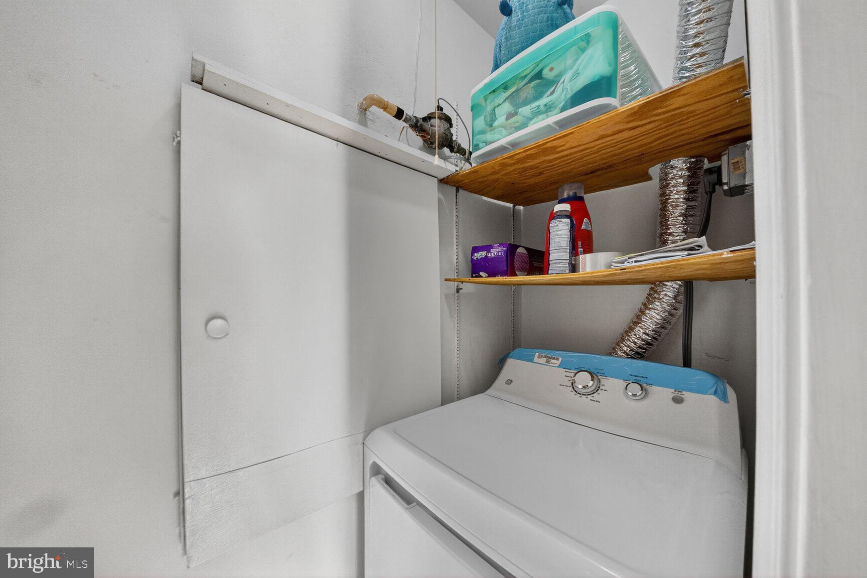 14901 McKisson Court, Unit 7CC Silver Spring, MD 20906 - Photo 10 of 34 Separate laundry area w/full sized washer dryer