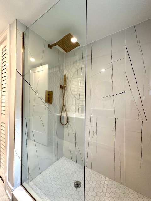 906 Revere Road Glenview, IL 60025 - Photo 13 of 32 a bathroom with a shower