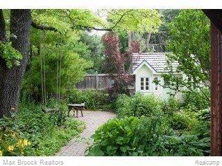 9645 Norman Road Clarkston, MI 48348 - Photo 12 of 16 Perennial garden w sitting area