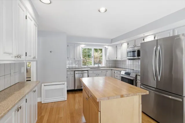 a view of livingroom with furniture wooden floor and window