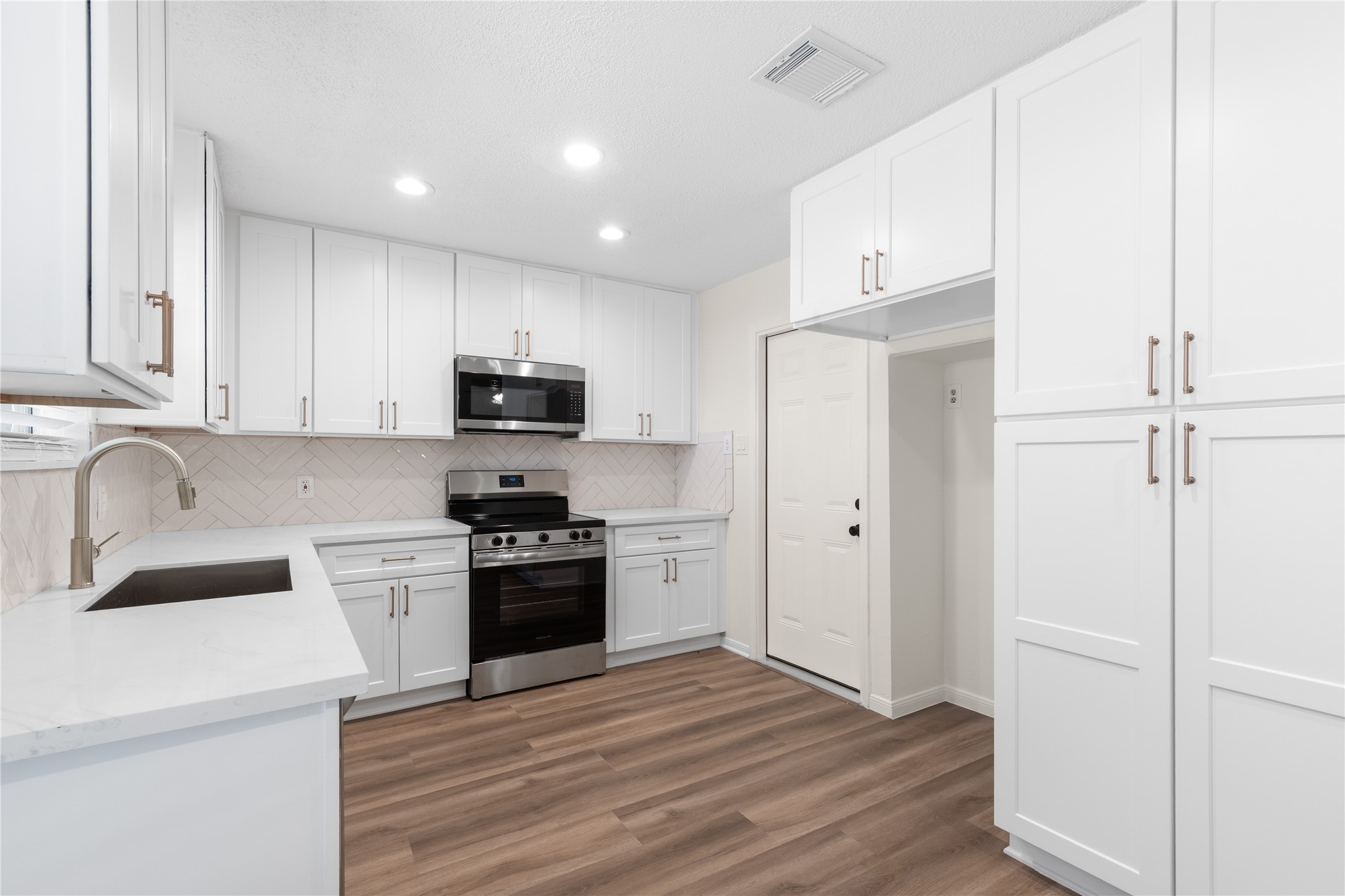 907 Avenue B Sweeny, TX 77480 - Photo 11 of 23 Beautiful brand-new kitchen