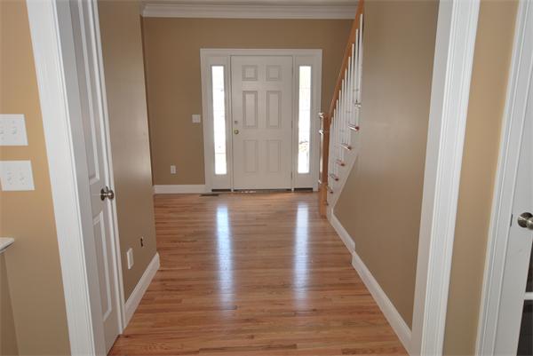 265 Maple Avenue Rutland, MA 01543 - Photo 2 of 13 a view of a hallway with wooden floor