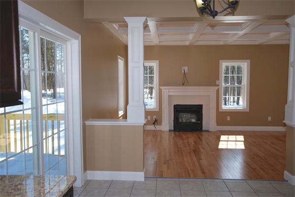 265 Maple Avenue Rutland, MA 01543 - Photo 4 of 13 a view of a livingroom with wooden floor and a fireplace