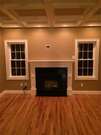 265 Maple Avenue Rutland, MA 01543 - Photo 5 of 13 a view of empty room with a fireplace and window