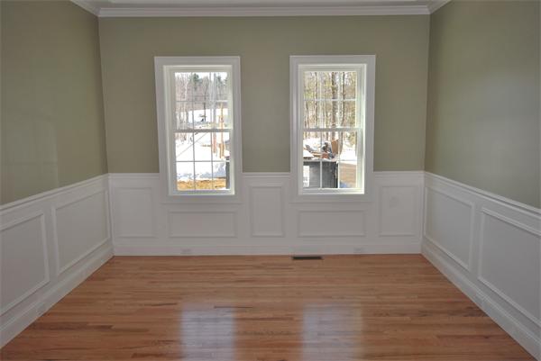 265 Maple Avenue Rutland, MA 01543 - Photo 7 of 13 a view of an empty room with wooden floor and a window