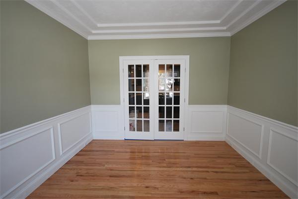 265 Maple Avenue Rutland, MA 01543 - Photo 8 of 13 a view of an empty room with wooden floor and a window