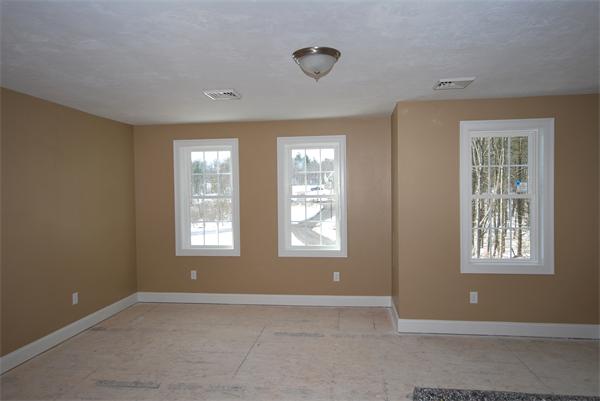 265 Maple Avenue Rutland, MA 01543 - Photo 9 of 13 a view of an empty room with windows