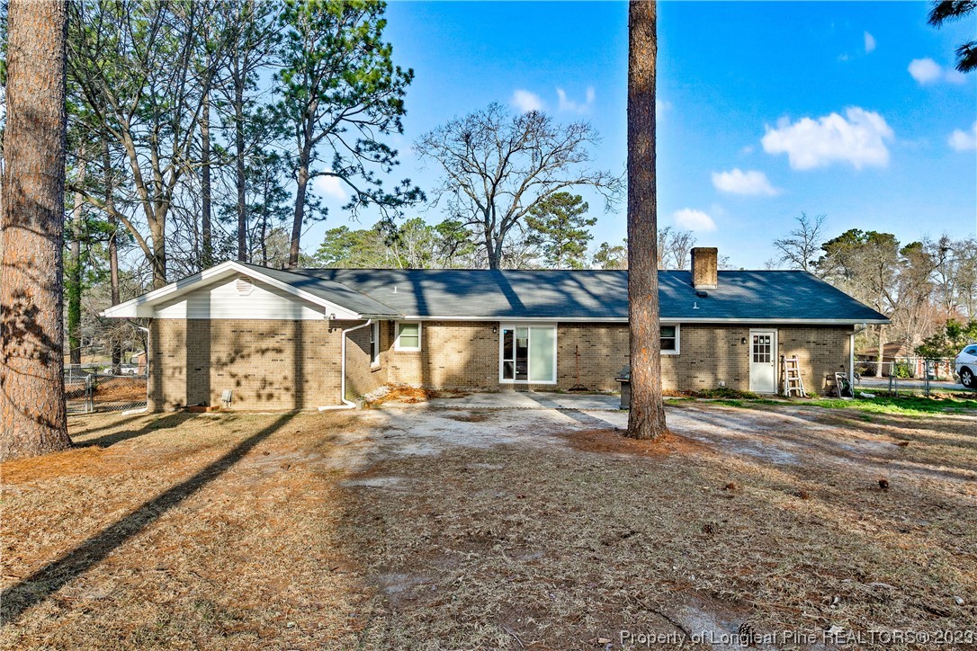 6433 Milford Road Fayetteville, NC 28303 - Photo 43 of 46 a view of a large house with a street