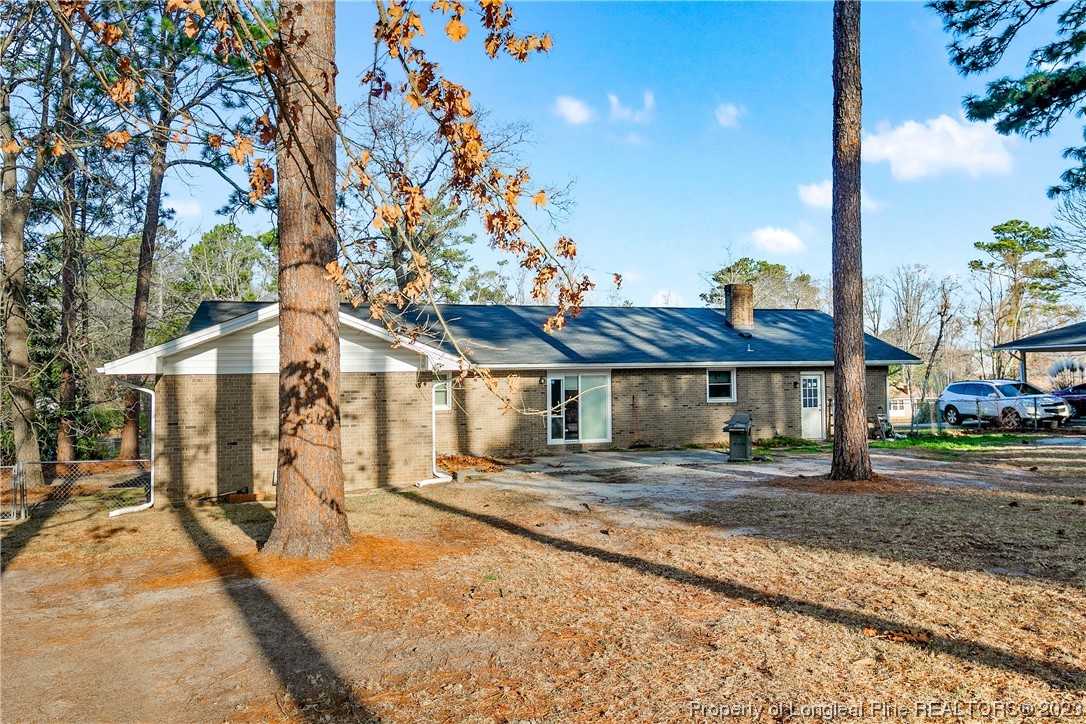 6433 Milford Road Fayetteville, NC 28303 - Photo 45 of 46 a house with a tree in front of it