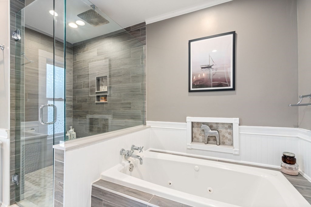11 Spring Lane Maynard, MA 01754 - Photo 18 of 39 a bathroom with a bathtub and shower