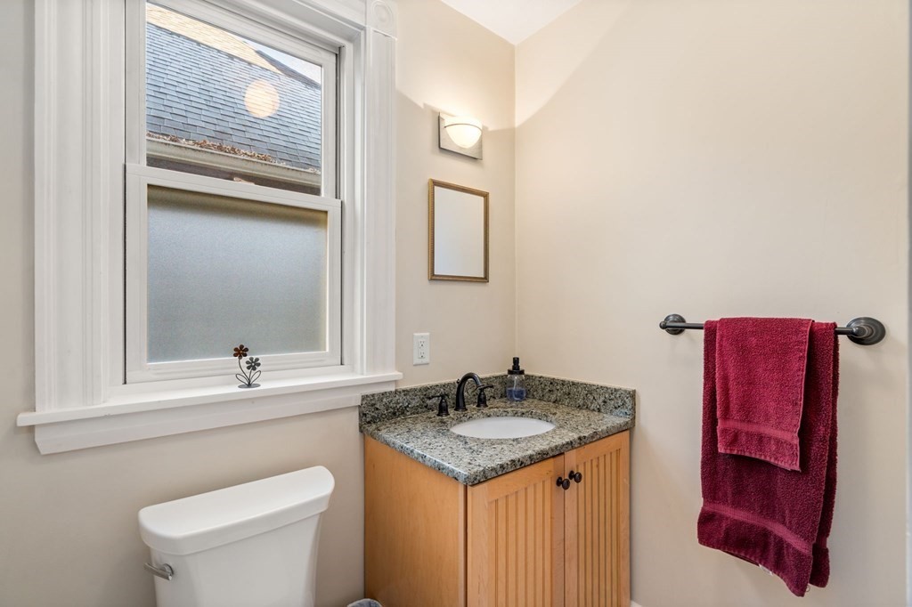 11 Spring Lane Maynard, MA 01754 - Photo 22 of 39 a bathroom with a granite countertop sink toilet and mirror