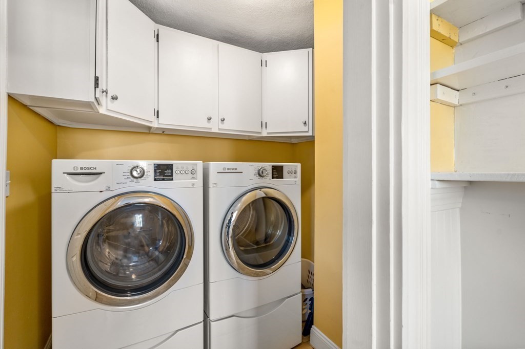 11 Spring Lane Maynard, MA 01754 - Photo 23 of 39 a utility room with dryer and washer