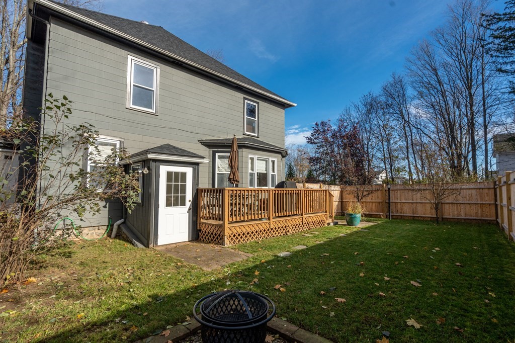 11 Spring Lane Maynard, MA 01754 - Photo 31 of 39 a front view of house with yard