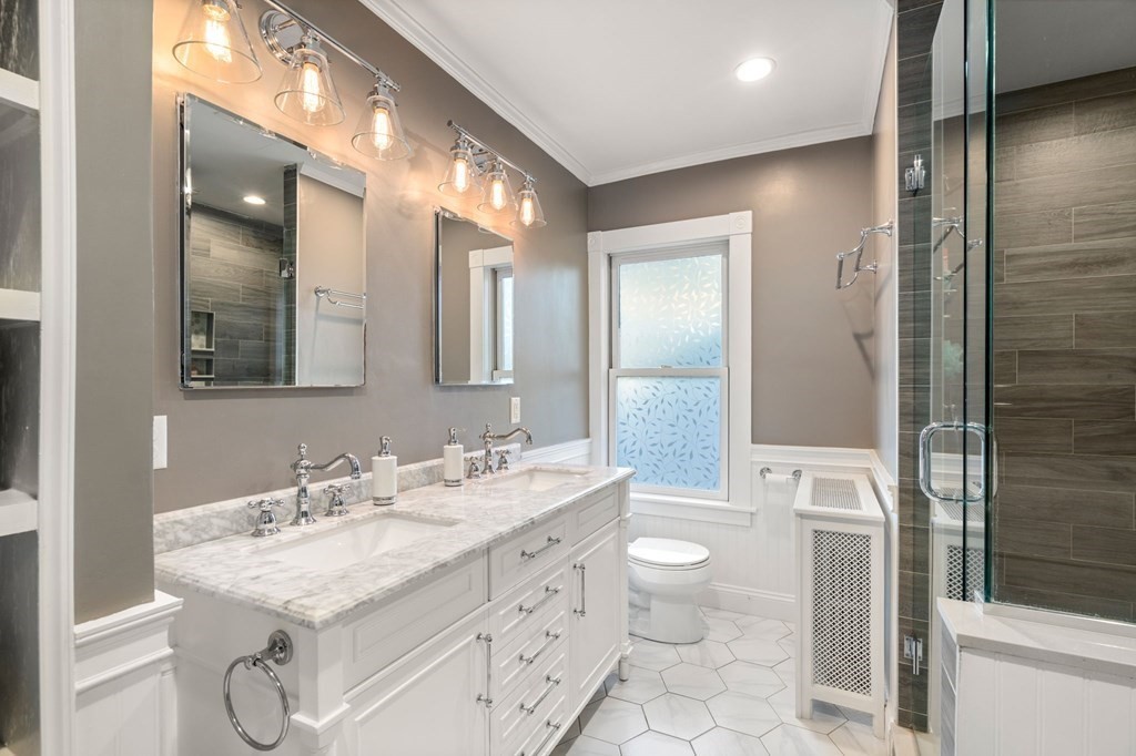 11 Spring Lane Maynard, MA 01754 - Photo 6 of 39 a bathroom with a double vanity sink toilet and shower