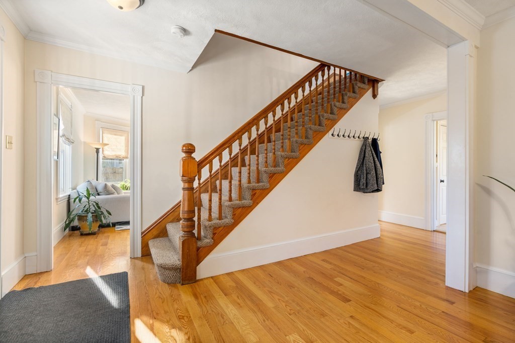 11 Spring Lane Maynard, MA 01754 - Photo 7 of 39 a view of entryway and hall with wooden floor