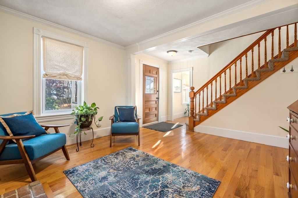 11 Spring Lane Maynard, MA 01754 - Photo 8 of 39 a living room with furniture and a rug