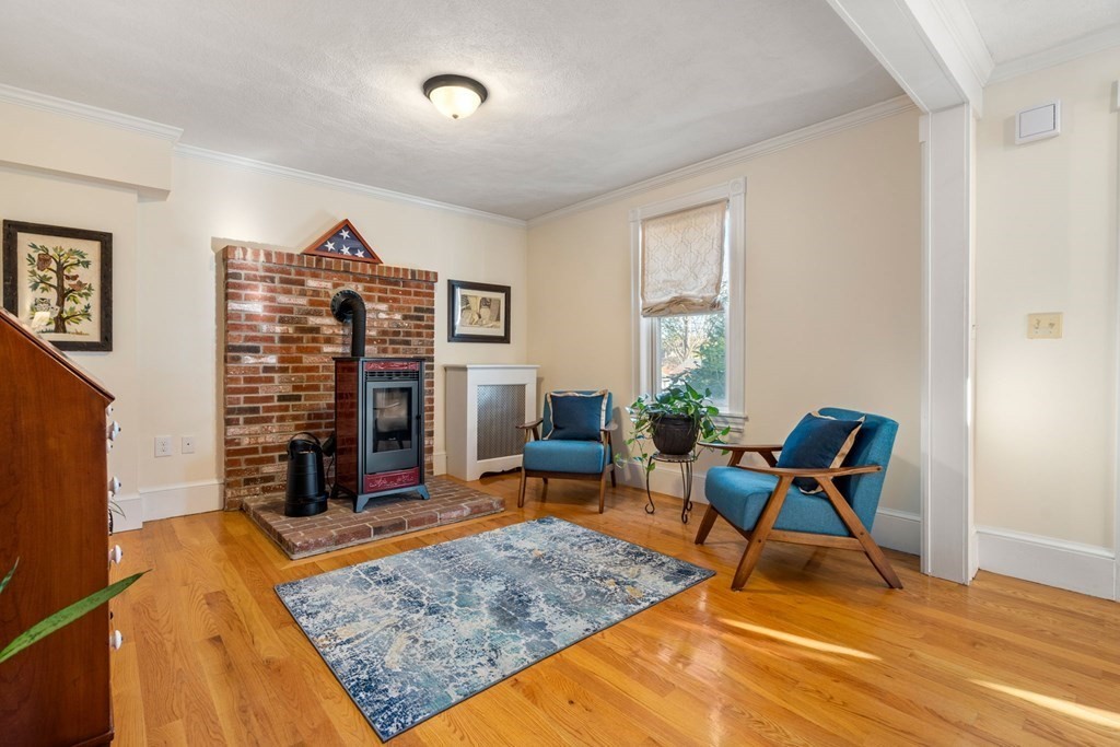 11 Spring Lane Maynard, MA 01754 - Photo 9 of 39 a living room with furniture rug and wooden floor