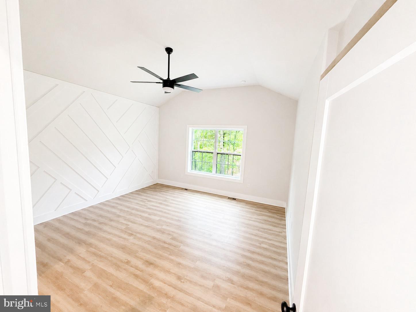 1321 Fulton Road Hedgesville, WV 25427 - Photo 12 of 36 a view of an empty room with a window