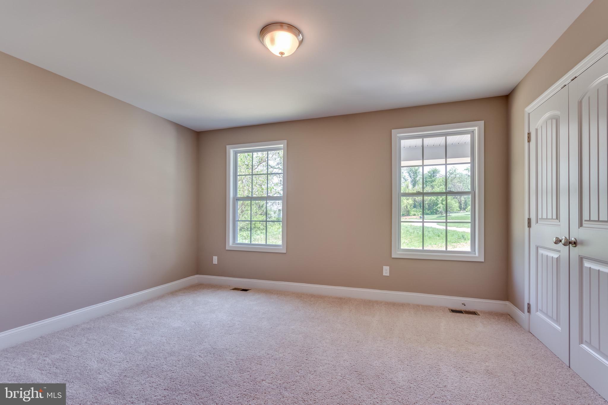 25 Fulton Road Hedgesville, WV 25427 - Photo 18 of 35 an empty room with a window