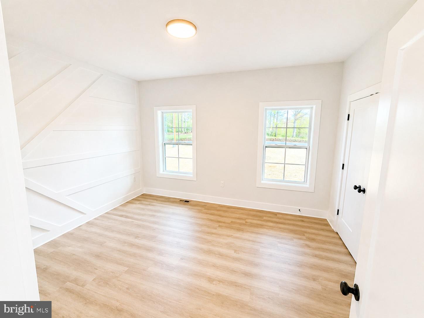 1321 Fulton Road Hedgesville, WV 25427 - Photo 22 of 36 an empty room with windows