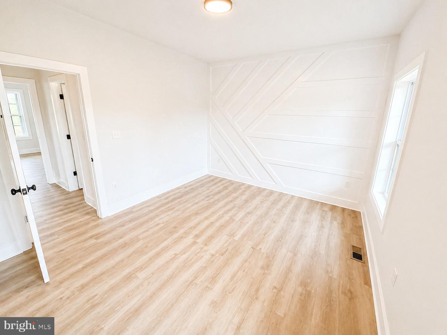 1321 Fulton Road Hedgesville, WV 25427 - Photo 23 of 36 a view of a room with wooden floor