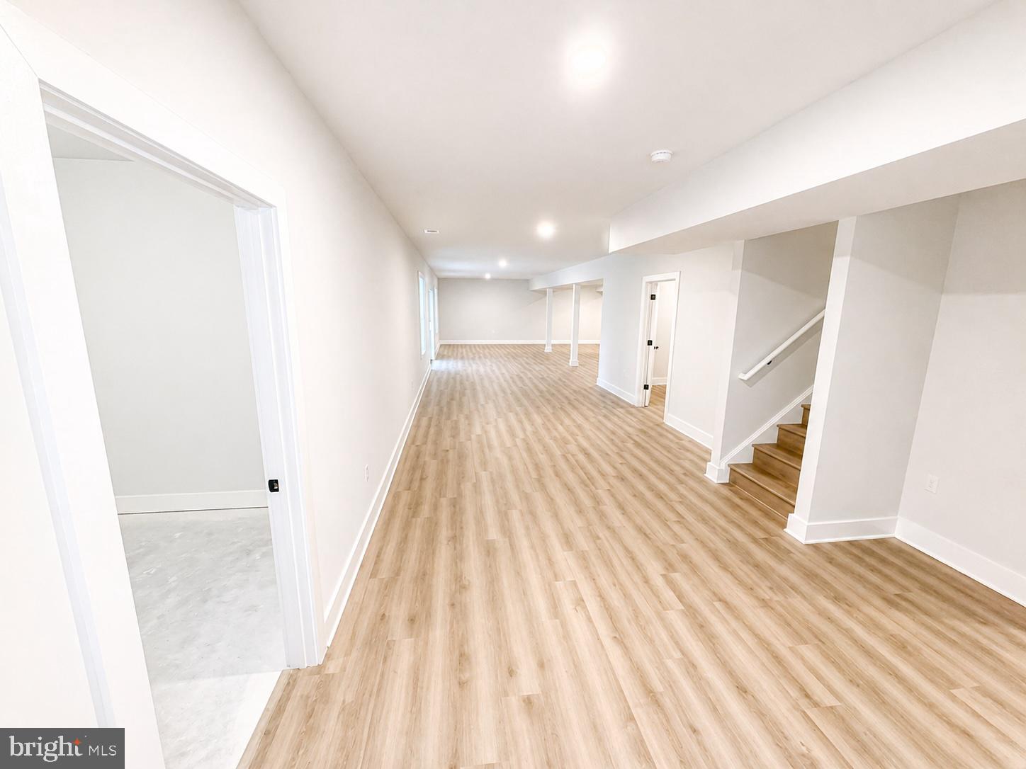 1321 Fulton Road Hedgesville, WV 25427 - Photo 26 of 36 a view of a room with wooden floor